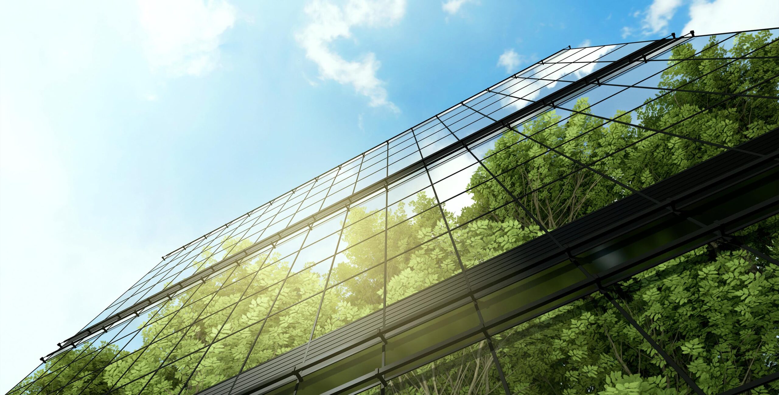 ground view of building with reflective window panels