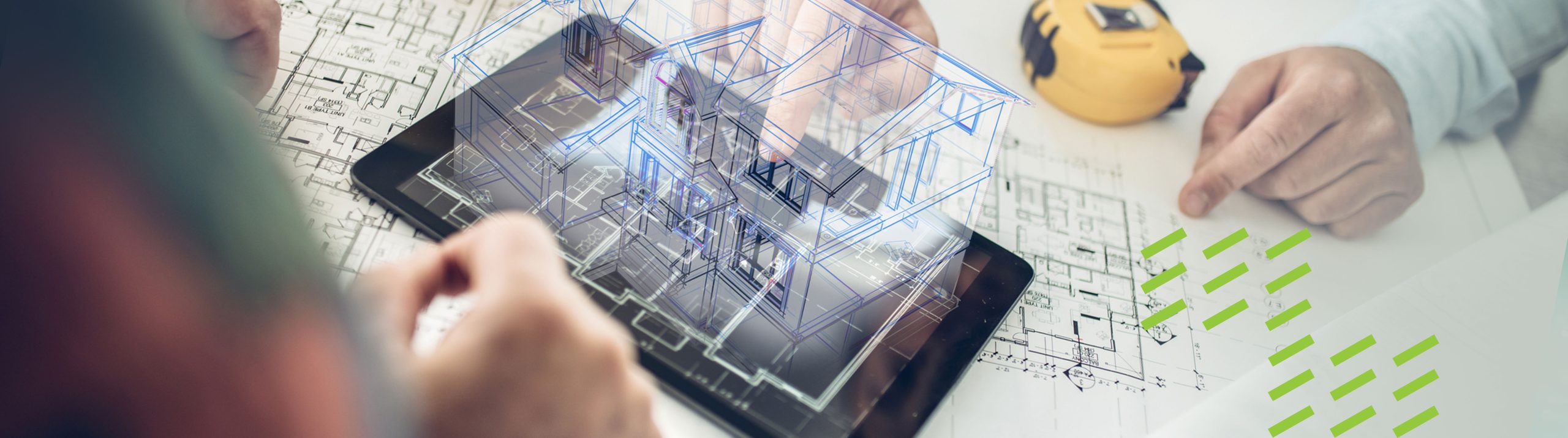 A 3-dimenstional, virtual representation of a building floats above plans laid out on a table as two people discuss a green building project.