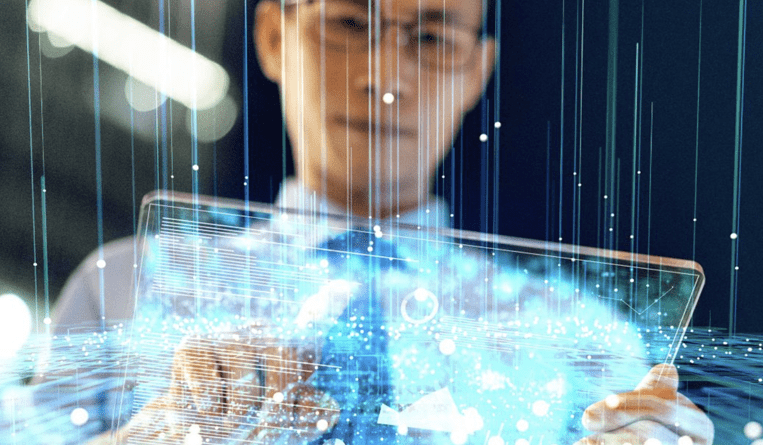 man touching iPad screen