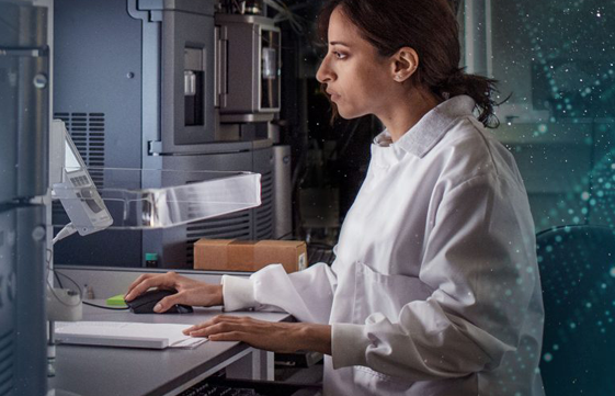 woman working at computer in a lab