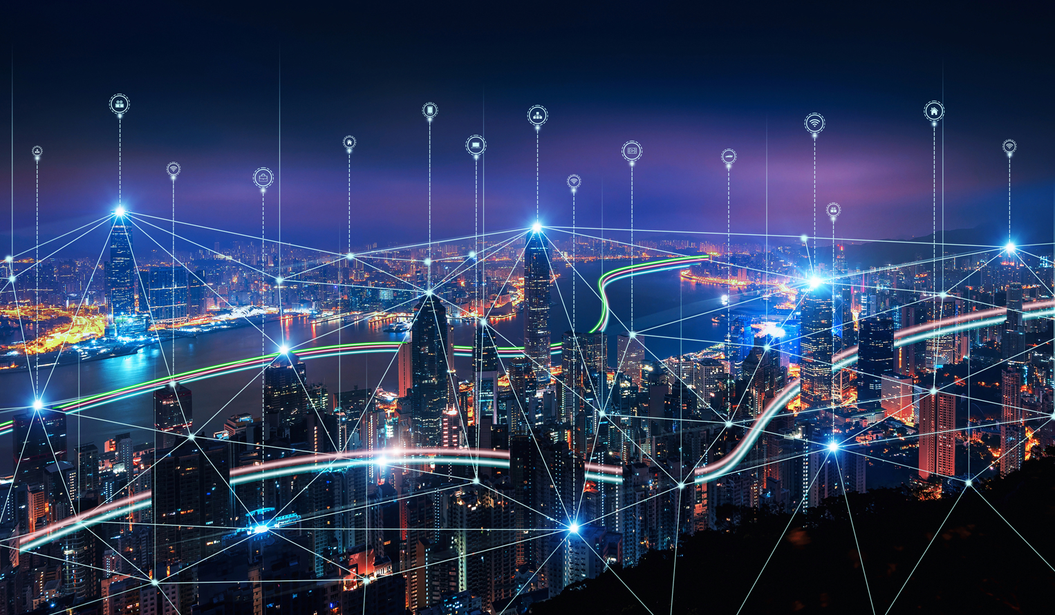 a city skyline at night with overlaid network of 5G connections