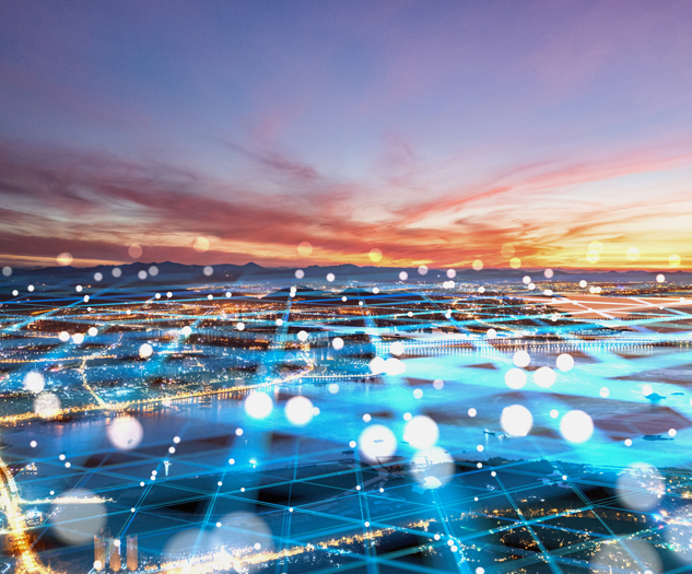 aerial view of a city and horizon with data network lines
