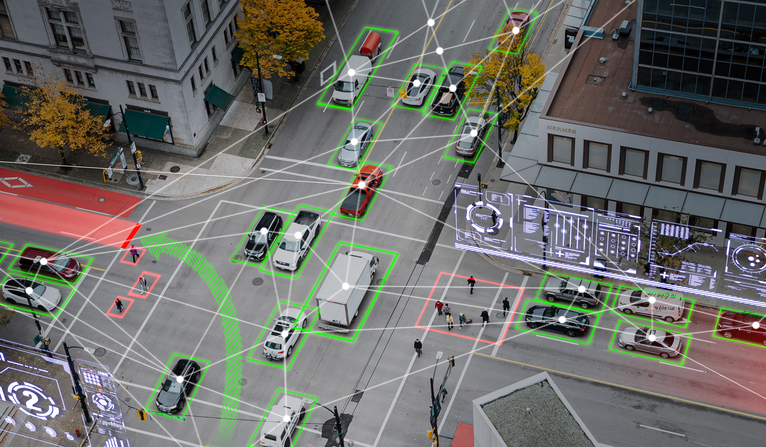 vehicles and people operating in a downtown intersection with indicators of detection and autonomous movement