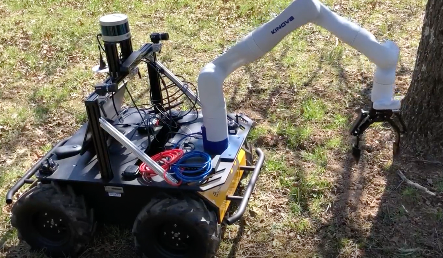 autonomous rover with robotic arm executing a soil sample collection outdoors